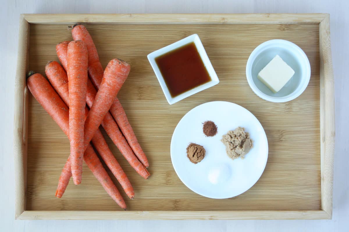 ingredients for honey glazed carrots - carrots, honey, butter and spices