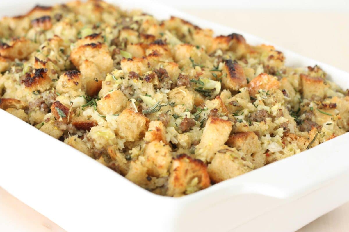 homemade stuffing in a white casserole dish