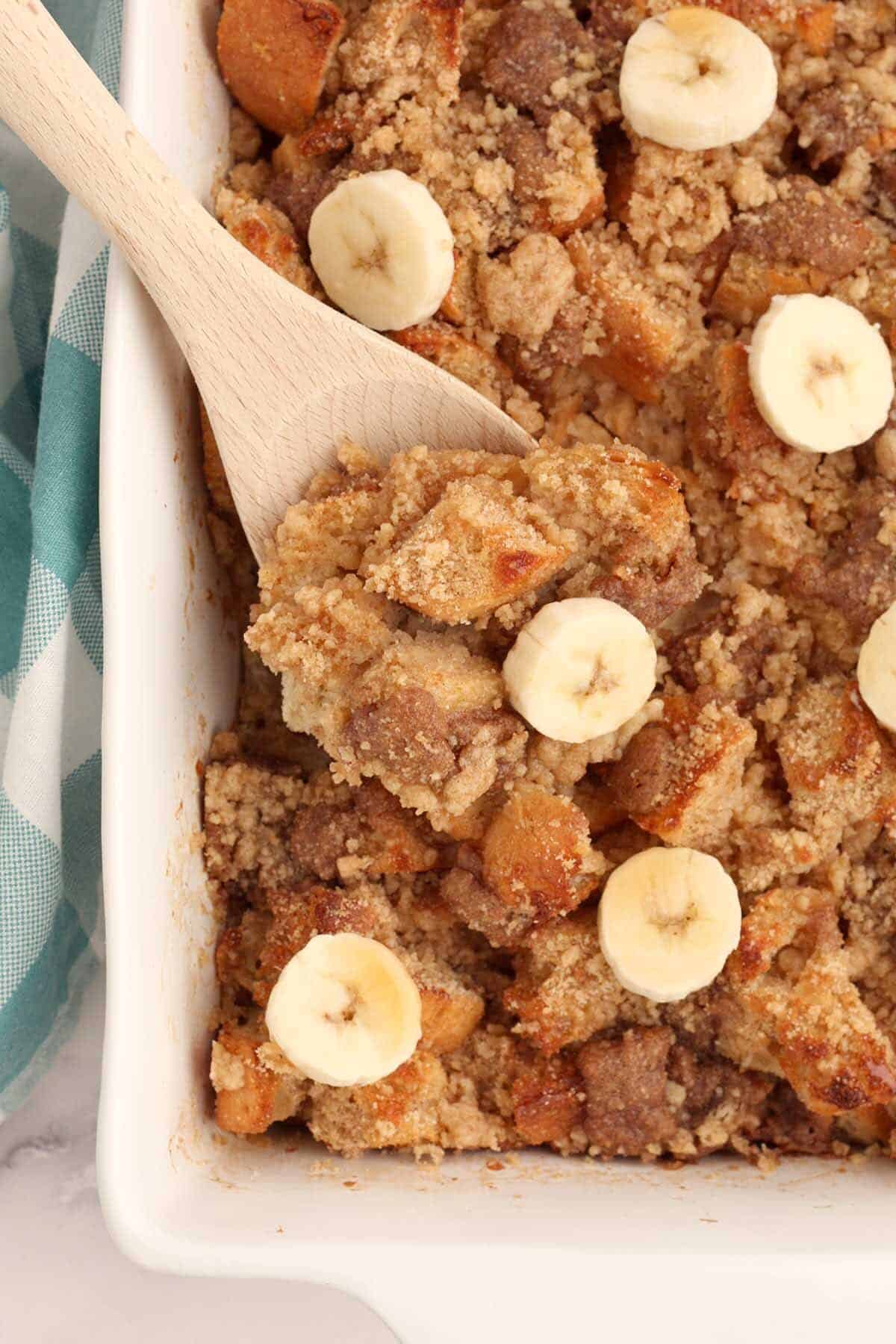 Baked french toast casserole topped with fresh bananas