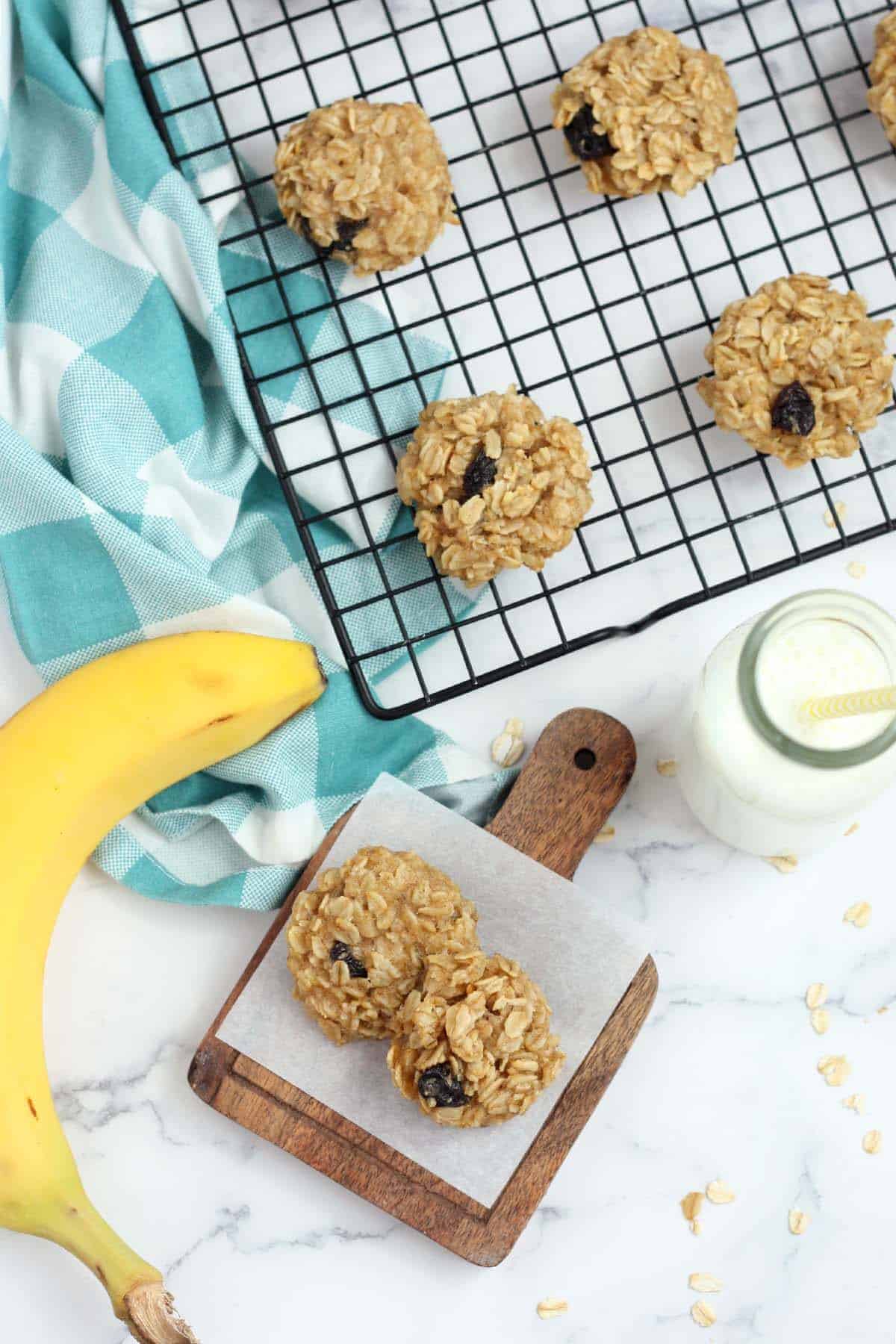 sugar free cookies on a wire rack with a glass of milk