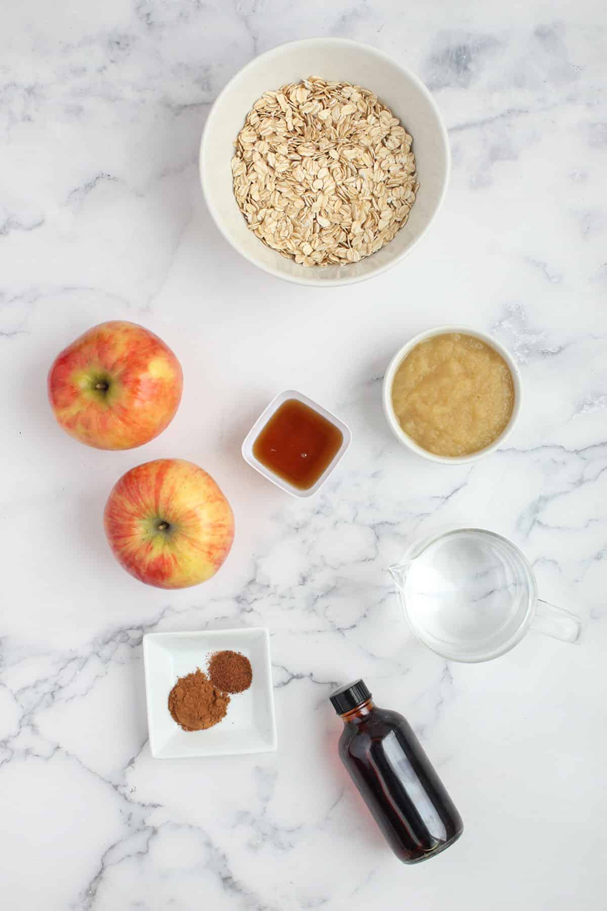 Ingredients for oatmeal with apple and cinnamon