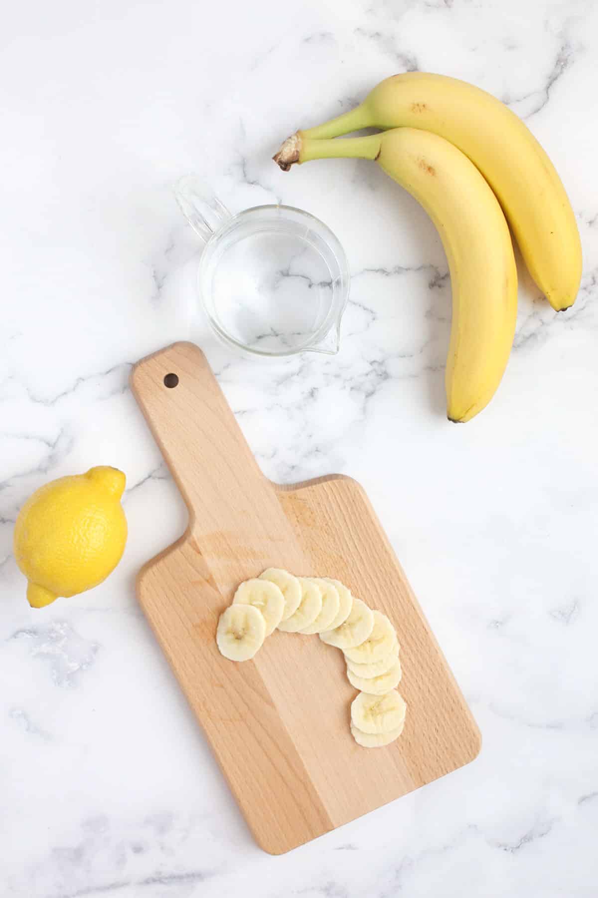 ingredients needed for  homemade banana chips: fresh bananas, water, and lemon juice
