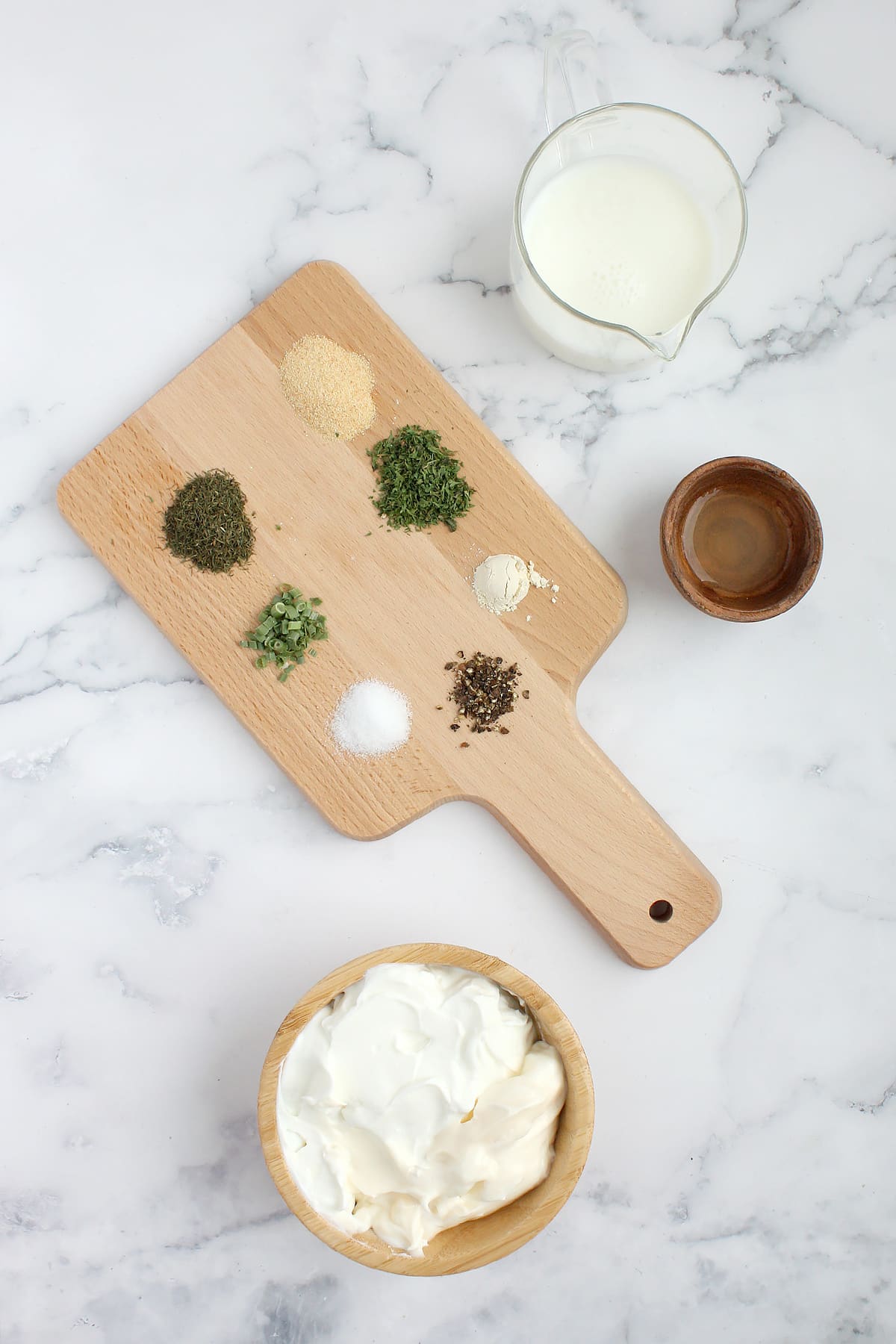 Ingredients needed for homemade ranch dressing.