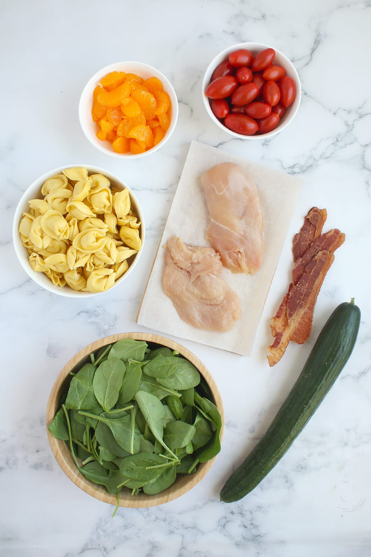 Ingredients for making tortellini pasta salad.