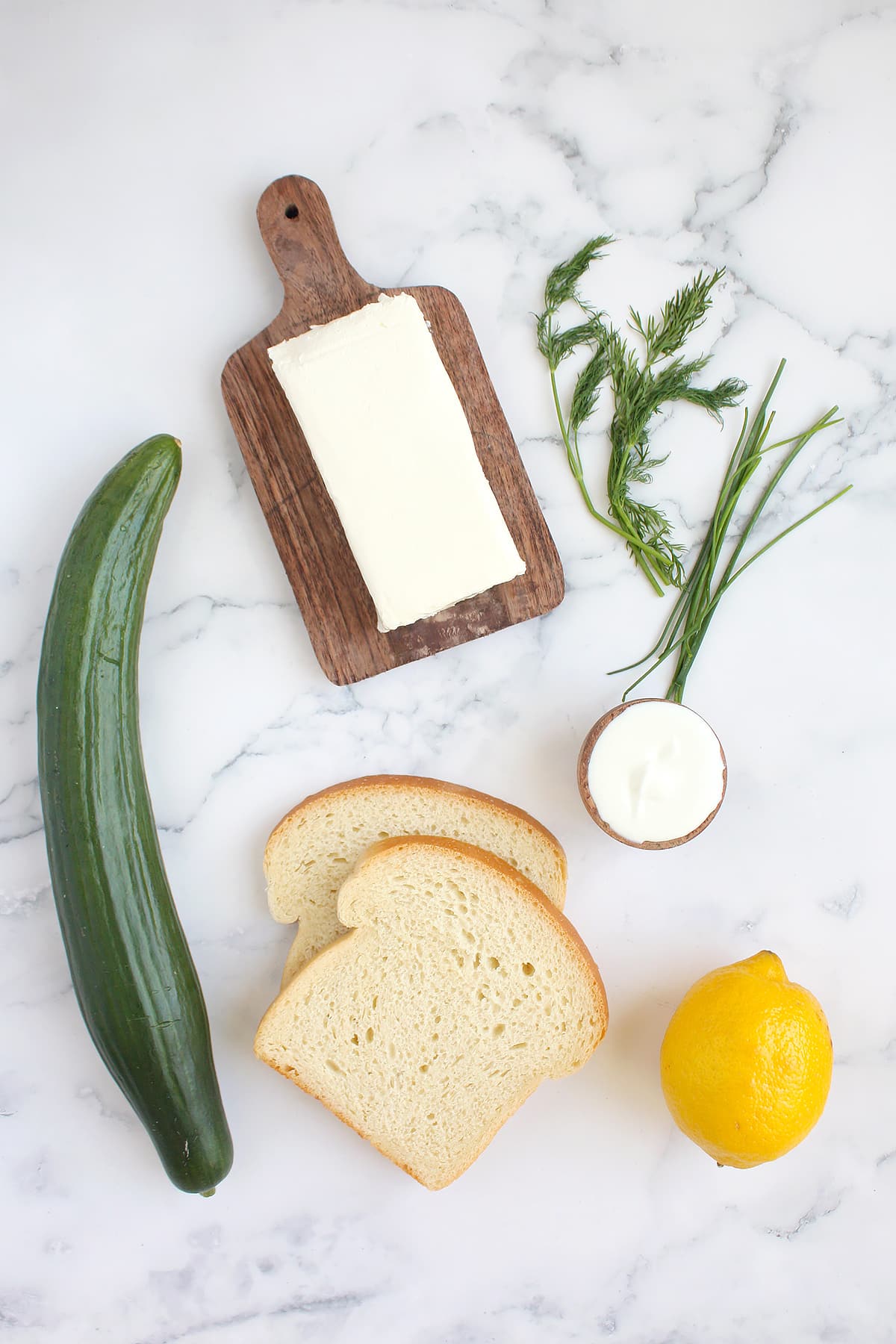 Ingredients you need to make cucumber sandwiches.