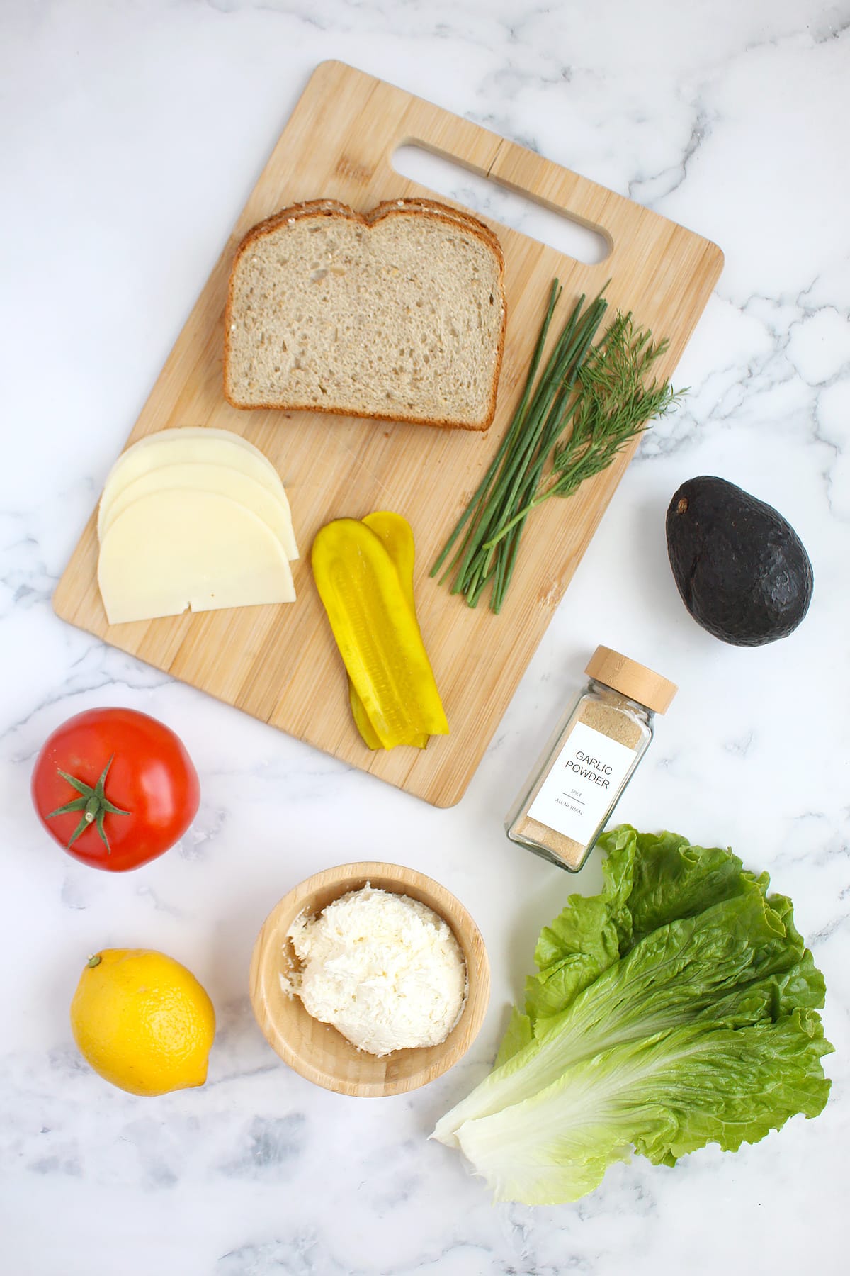 Ingredients you need to make a veggie sandwich.