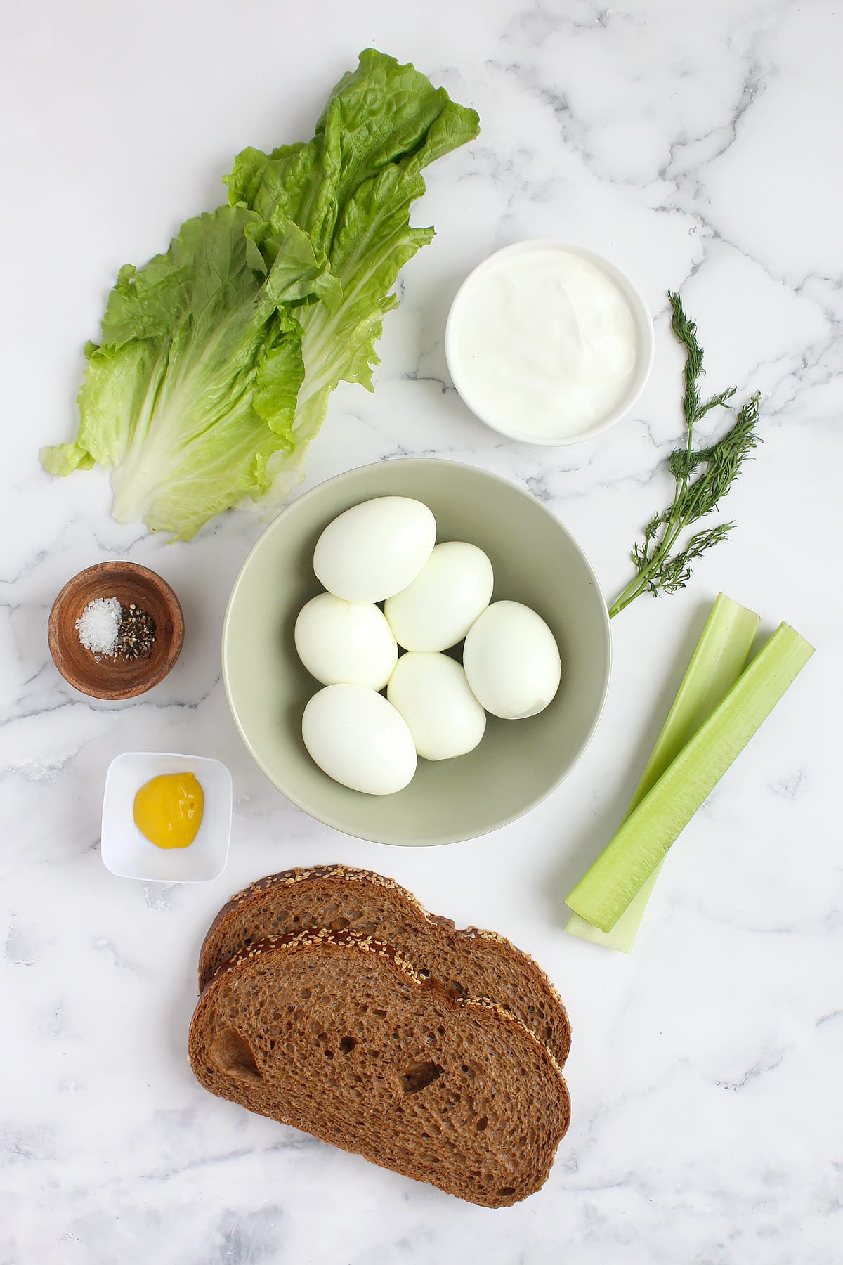 Ingredients you need to make egg salad sandwiches.