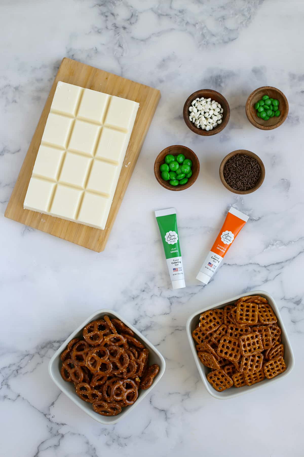 Ingredients you need to make chocolate dipped halloween pretzels.