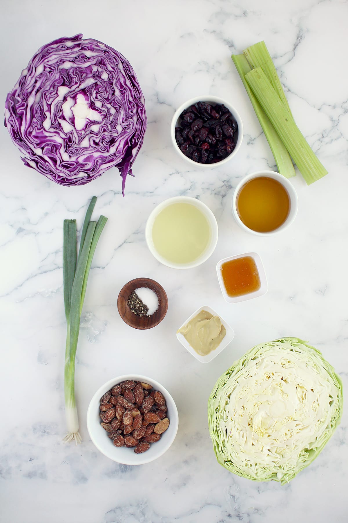 Ingredients needed to make smokey almond and cranberry coleslaw.