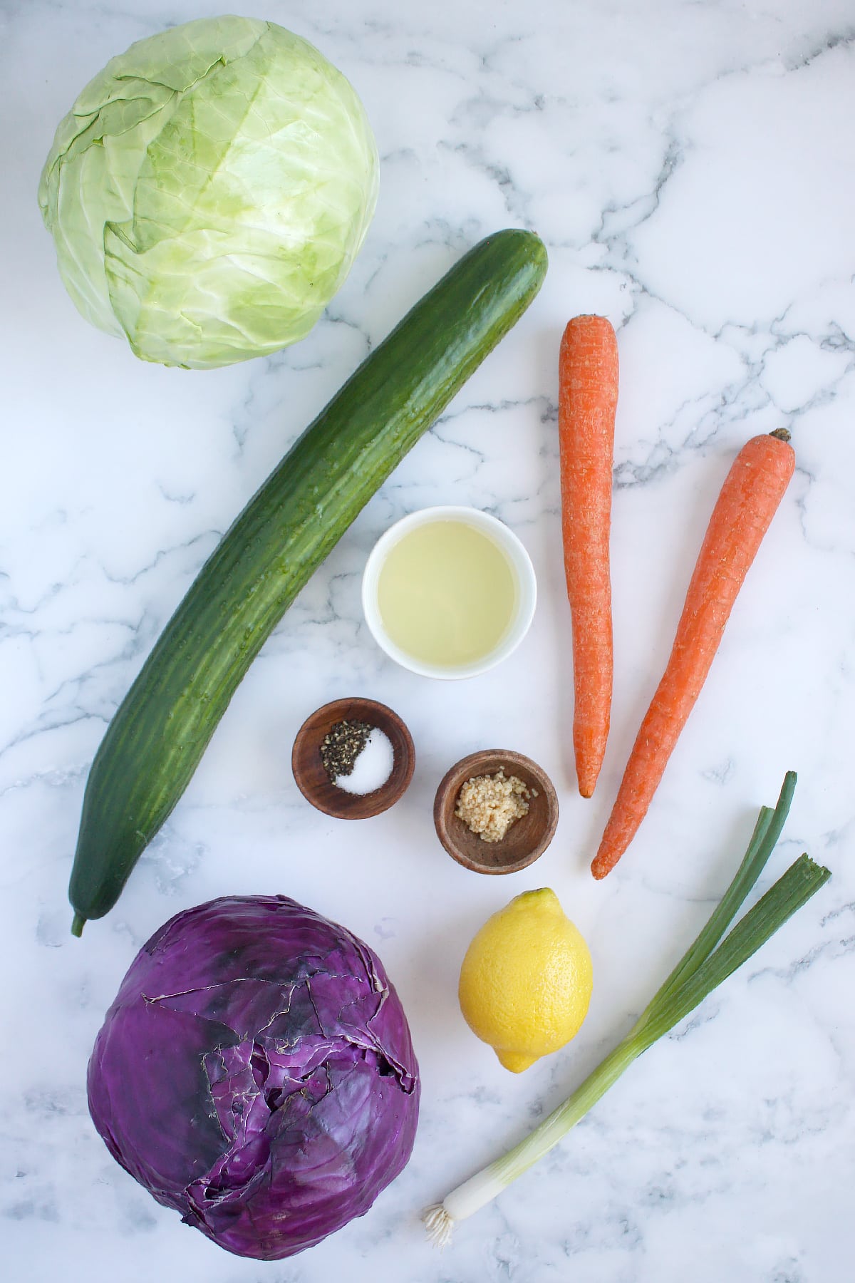 Ingredients needed to make sunshine coleslaw with lemon vinaigrette.