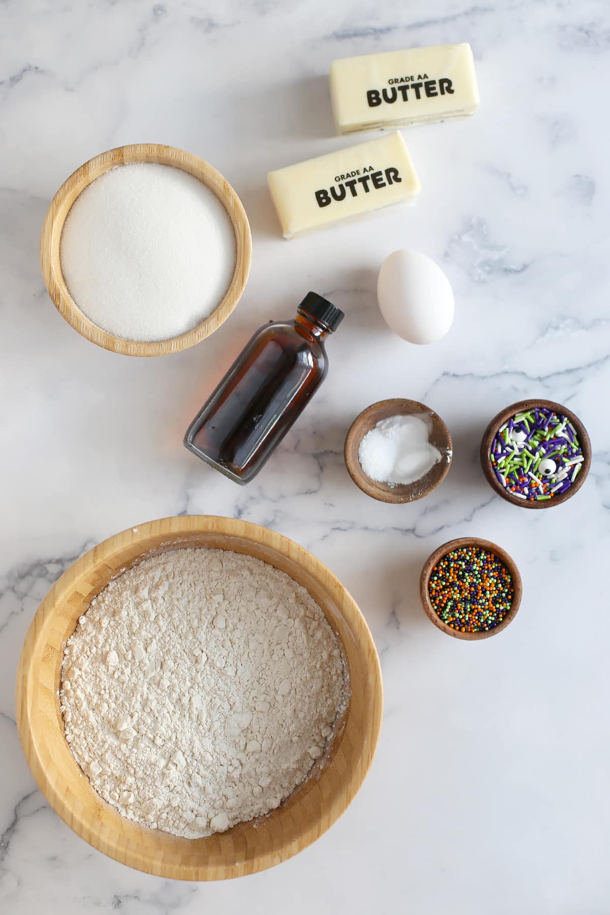 Ingredients you'll need to make halloween sugar cookies.