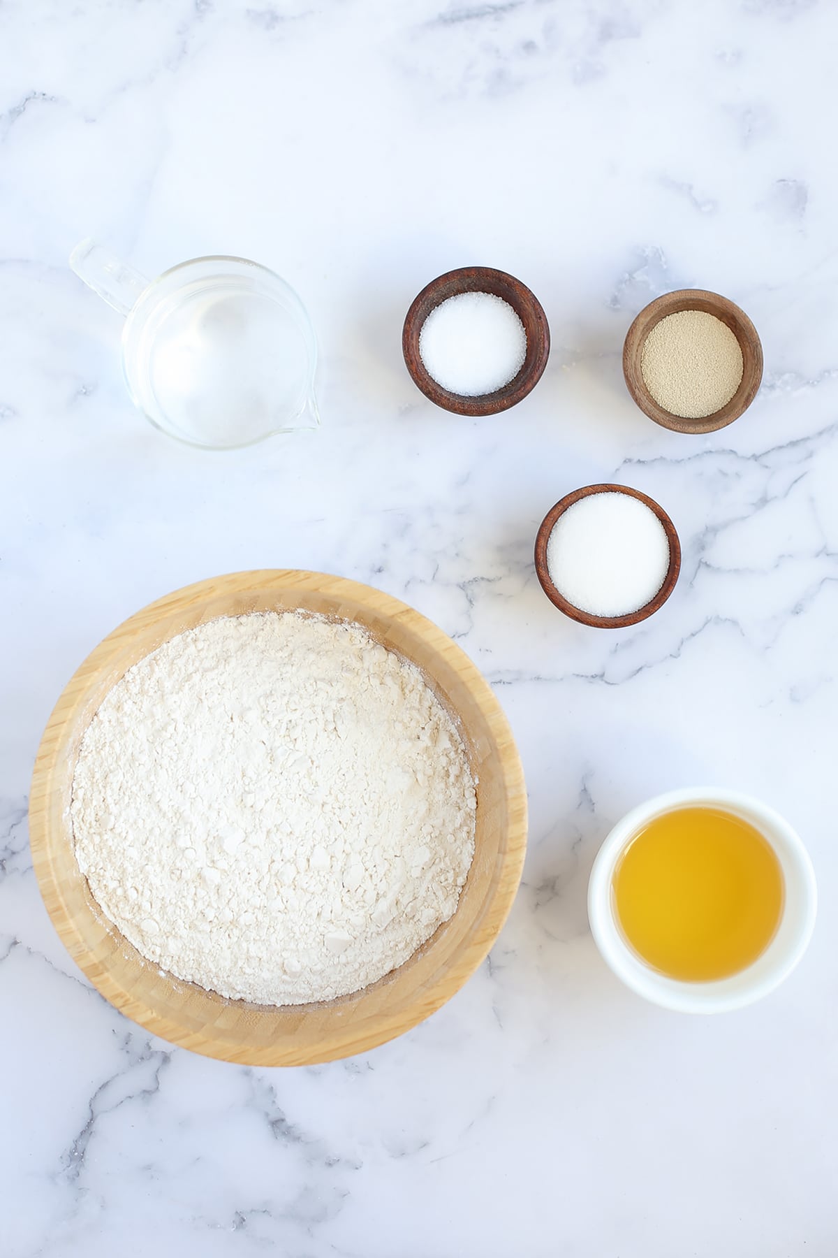 Ingredients you'll need to make easy dinner rolls.