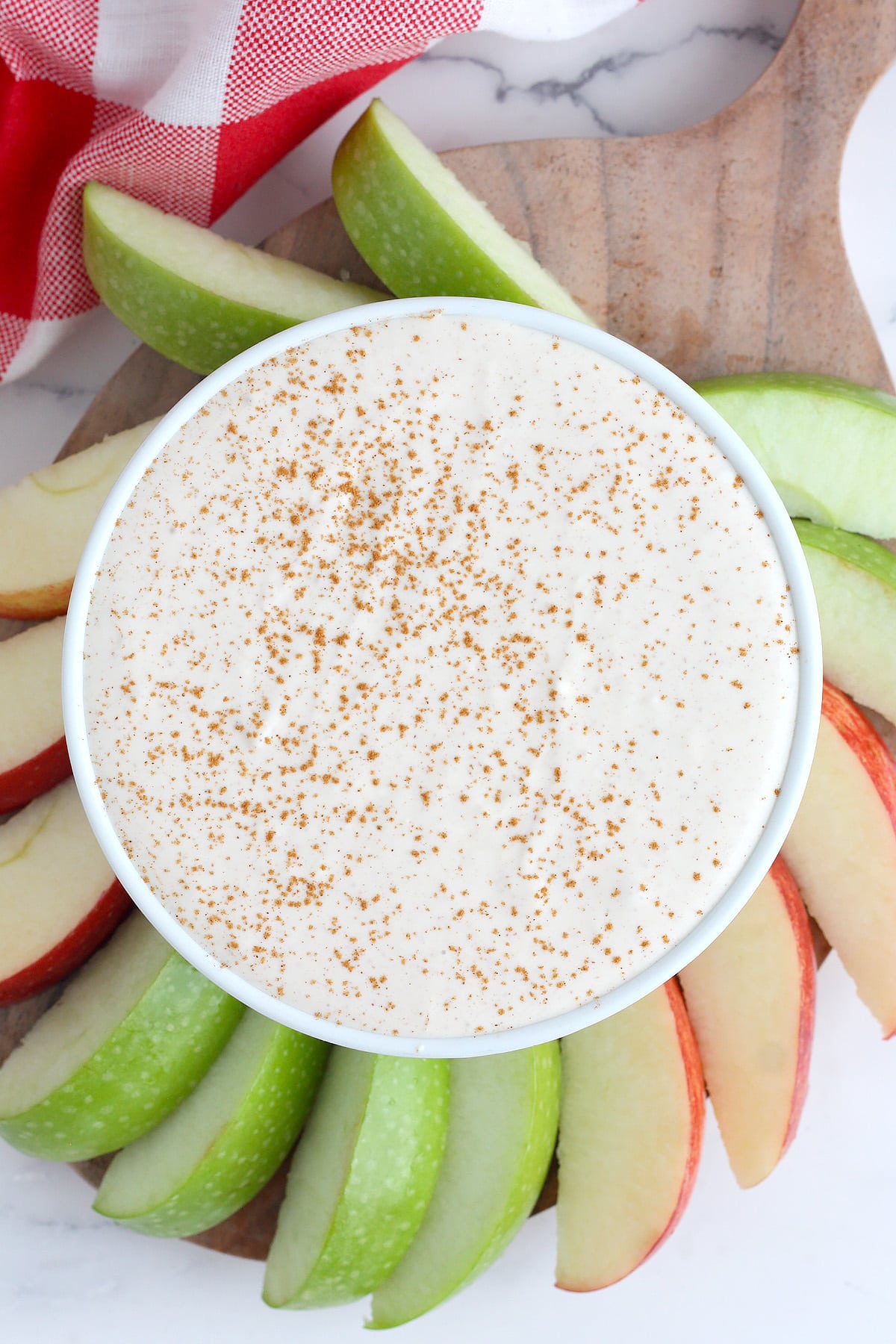 cinnamon yogurt dip with sliced apples