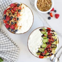 two bowls of cottage cheese with toppings on them