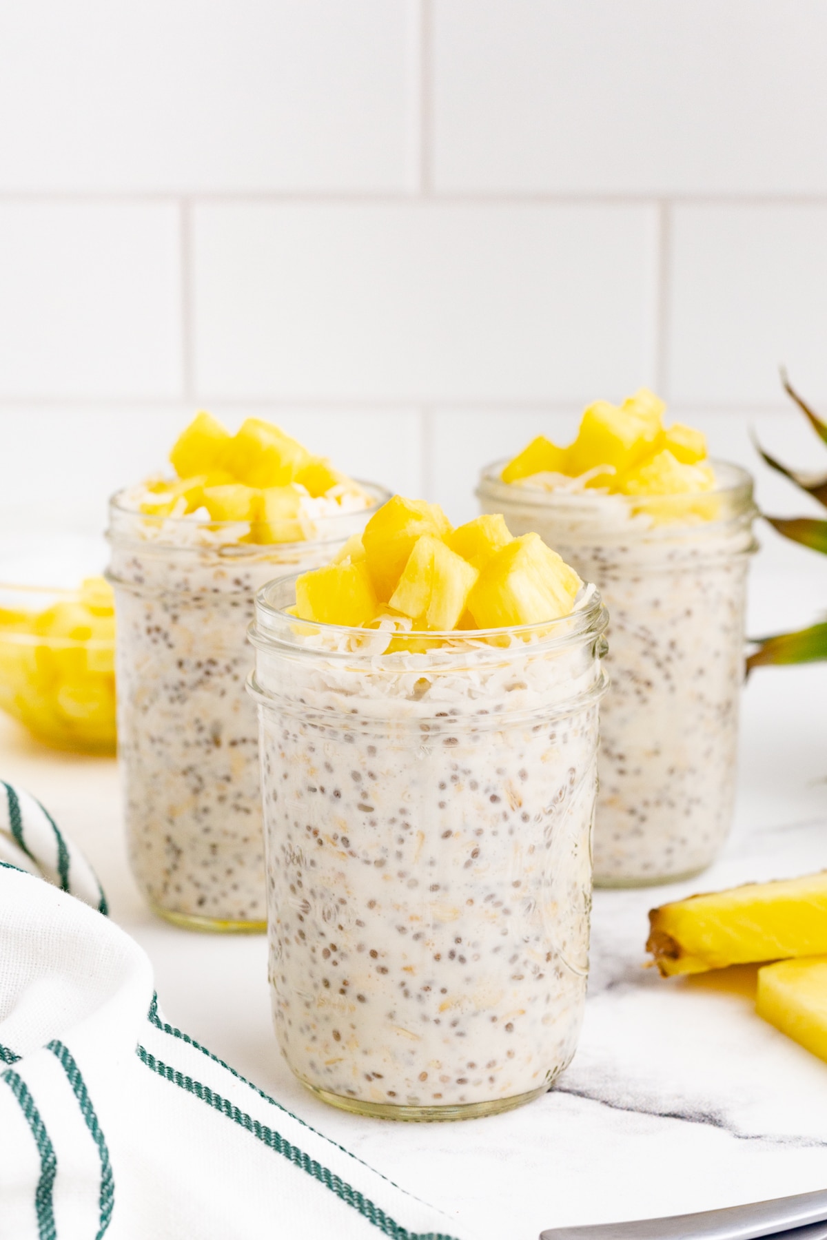 pineapple coconut overnight oats in mason jars