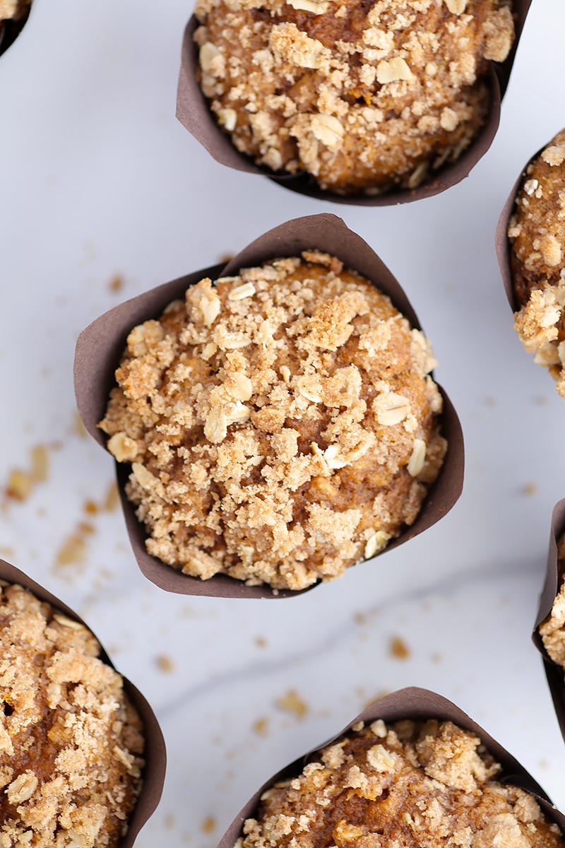 pumpkin streusel oat muffins in brown paper liners