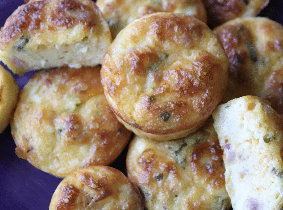 a close up picture of easy breakfast egg puffs on a blue platter