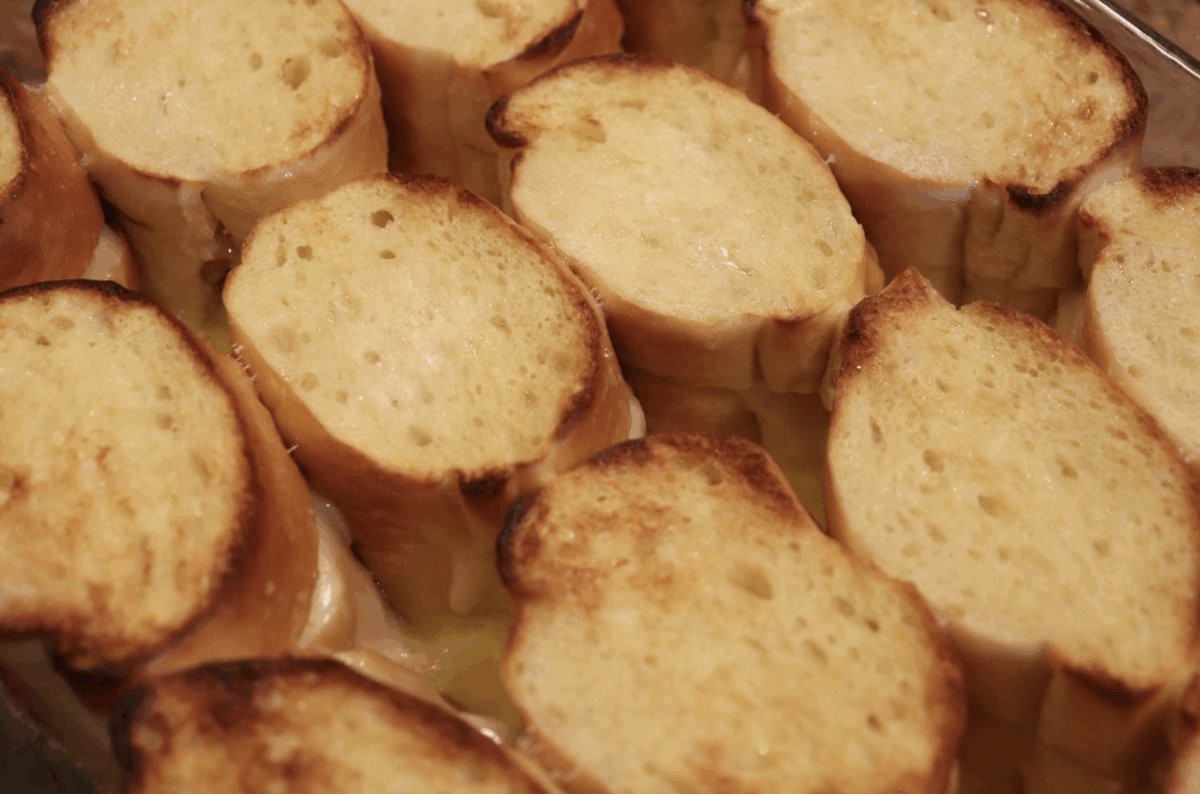 overnight stuffed french toast in a glass baking dish