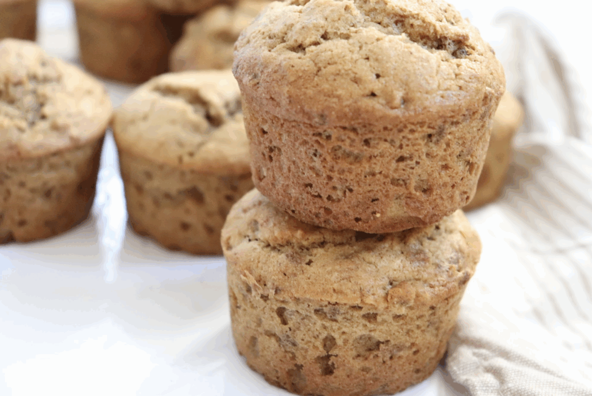 healthy bran muffins stacked on top of each other