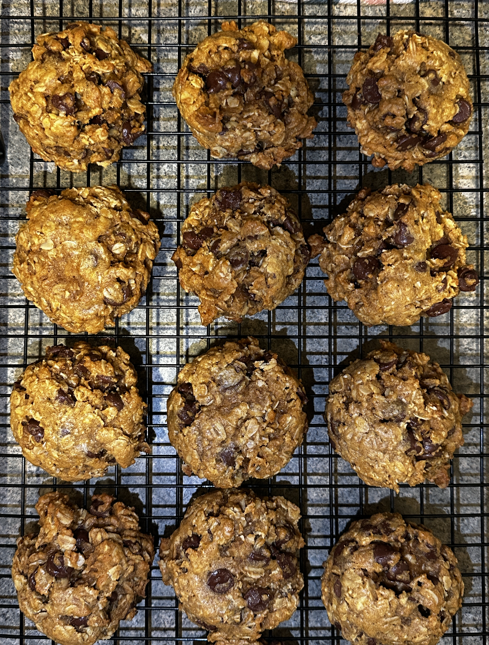 pumpkin chocolate chip oatmeal cookies on a cooling rack