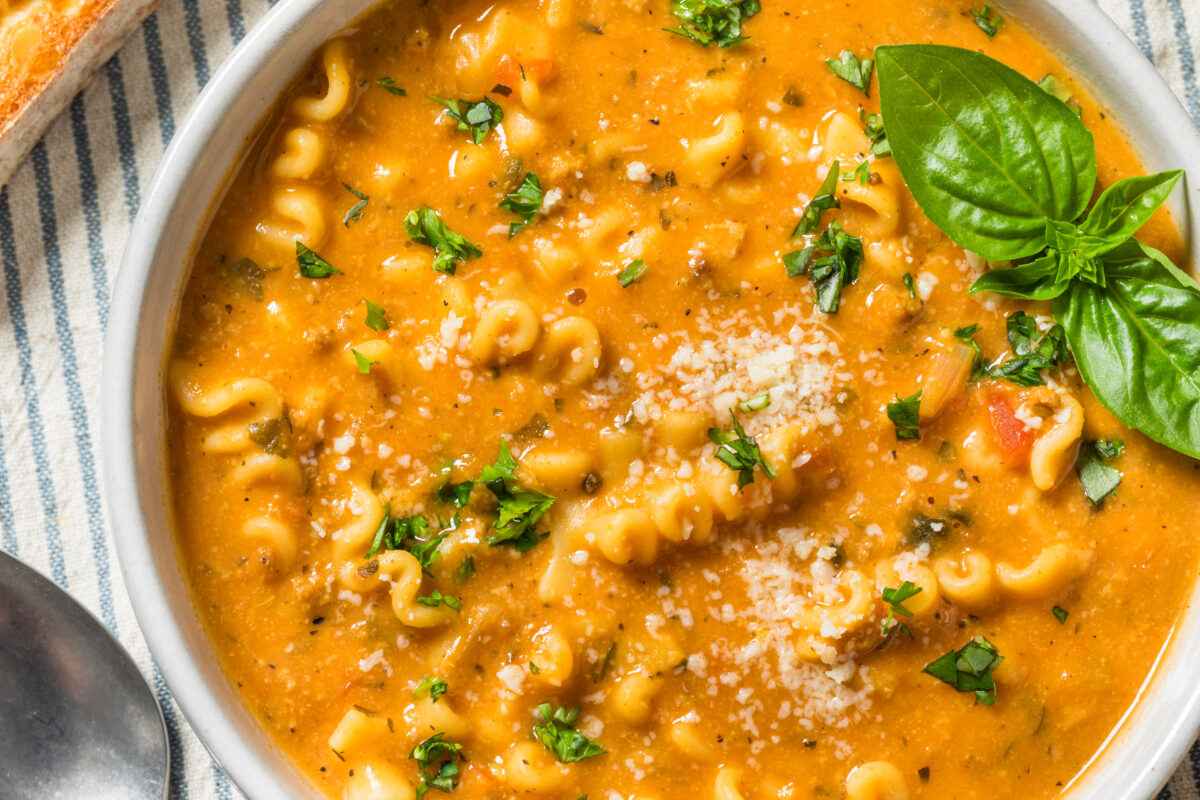 creamy italian sausage soup with fresh basil and parmesan cheese 