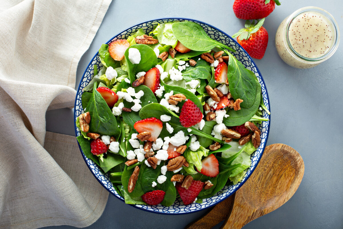 Fresh strawberries, spinach and goat cheese salad
