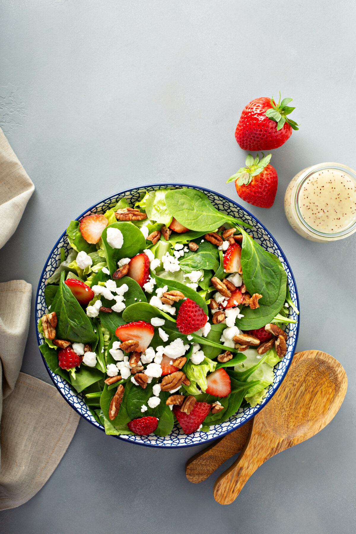 Fresh strawberries, spinach and goat cheese salad