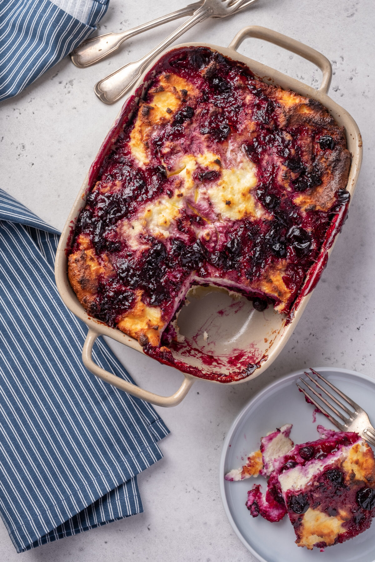 Cottage cheese casserole with blueberries in baking dish