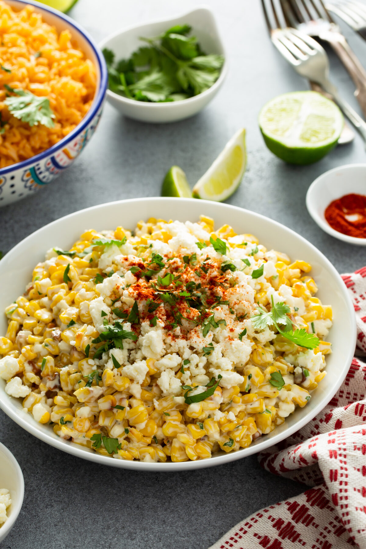 Mexican street corn, elote with cotija cheese, fresh cilantro and chili