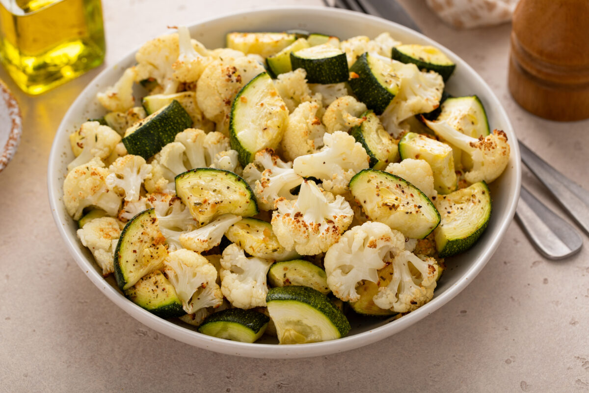 roasted cauliflower and zucchini in a serving bowl