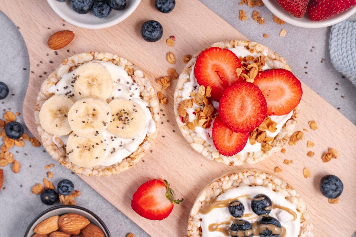 Rice Crackers Snack, Assorted Crackers Topped with Banana, Fresh Berries, Yogurt and Granola