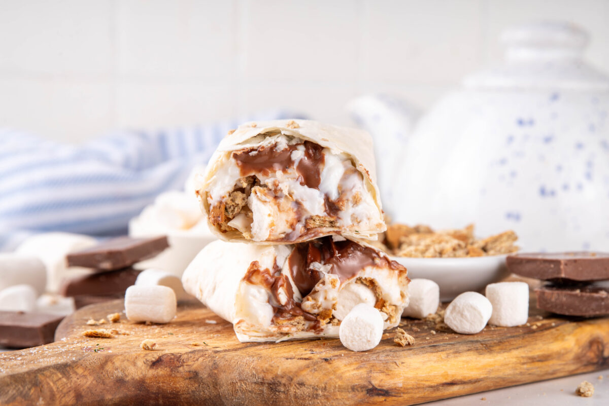 Homemade Air Fryer S'mores with melted chocolate, marshmallows and crumbled graham crackers