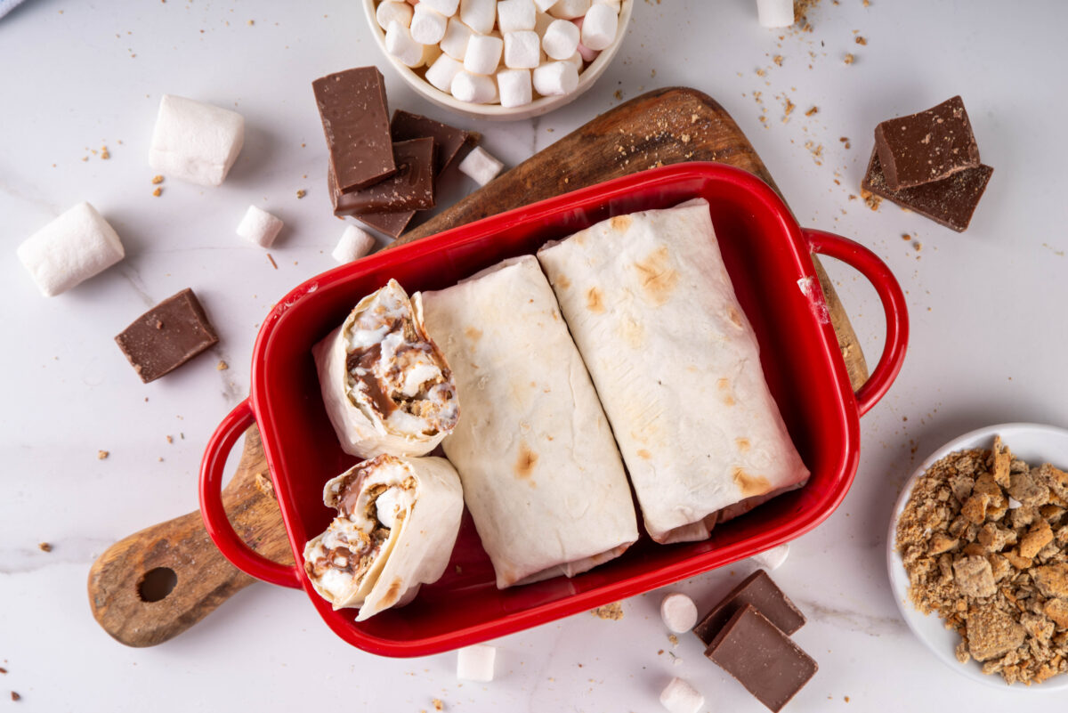 smores crunchwraps in a red baking dish