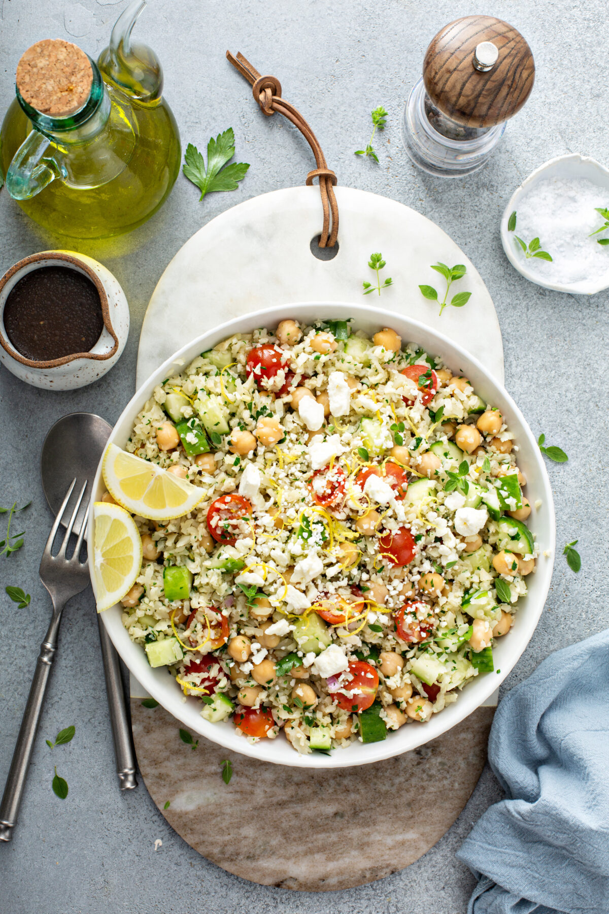 greek couscous salad in a serving bowl 