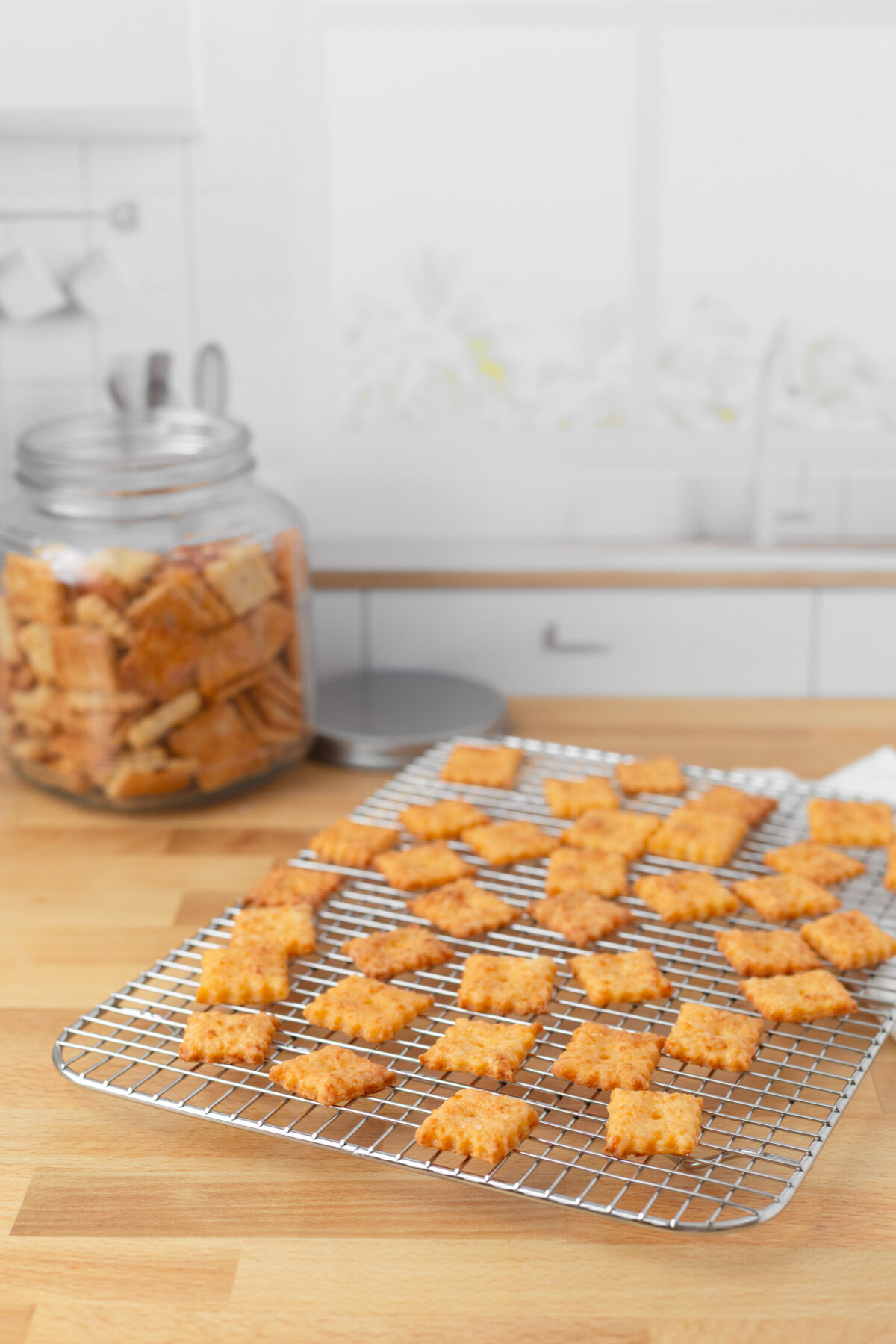 homemade cheese crackers on a cooling rack