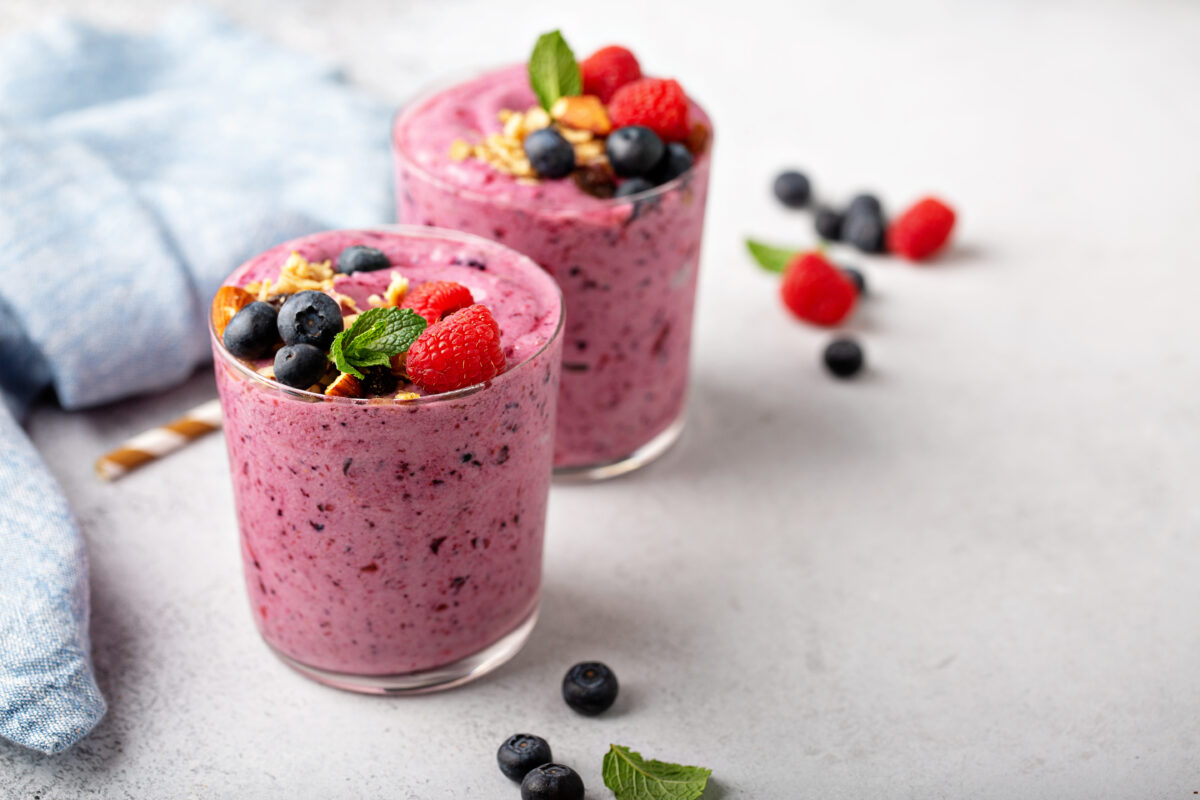 mixed berry protein smoothies with berries and mint
