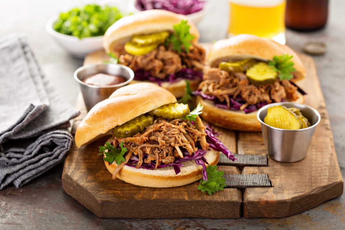 Pulled pork sandwiches with BBQ sauce, cabbage and pickles