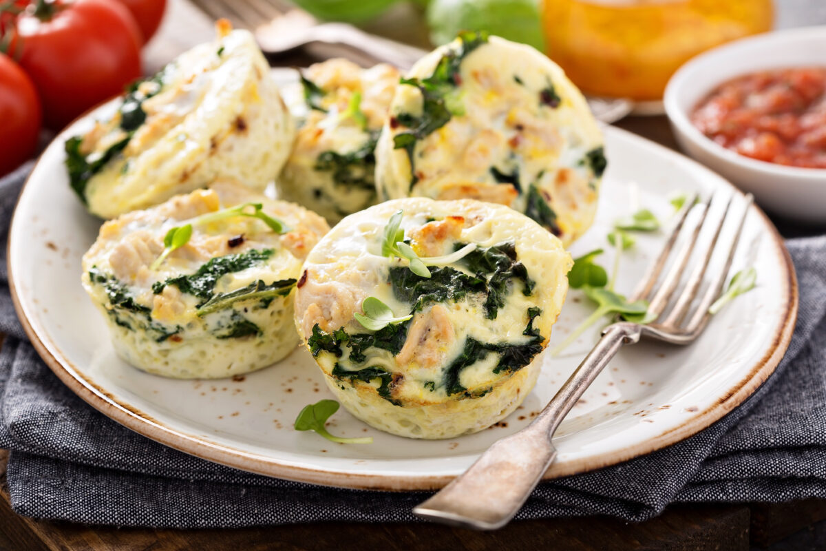 High protein egg muffins with kale and chicken on a serving plate