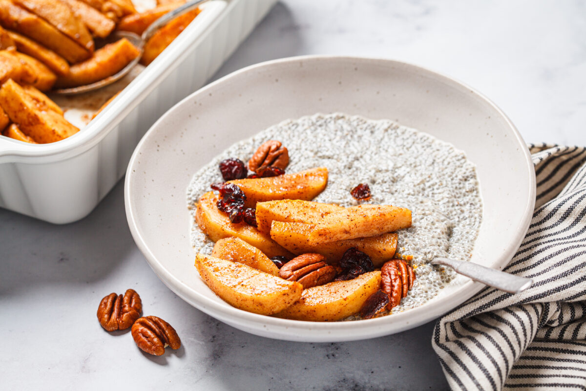 Chia pudding with caramelized apples, cinnamon, pecan and cranberries.