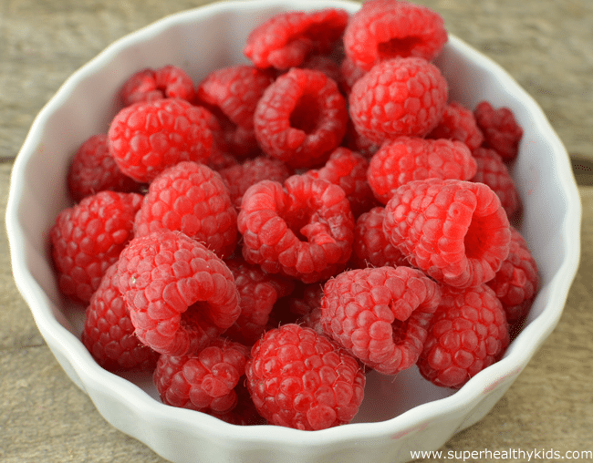 fresh raspberries in a white bowl for fiber