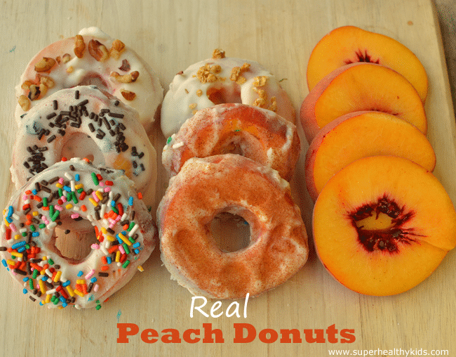 sliced peaches topped with yogurt and sprinkles to resemble donuts