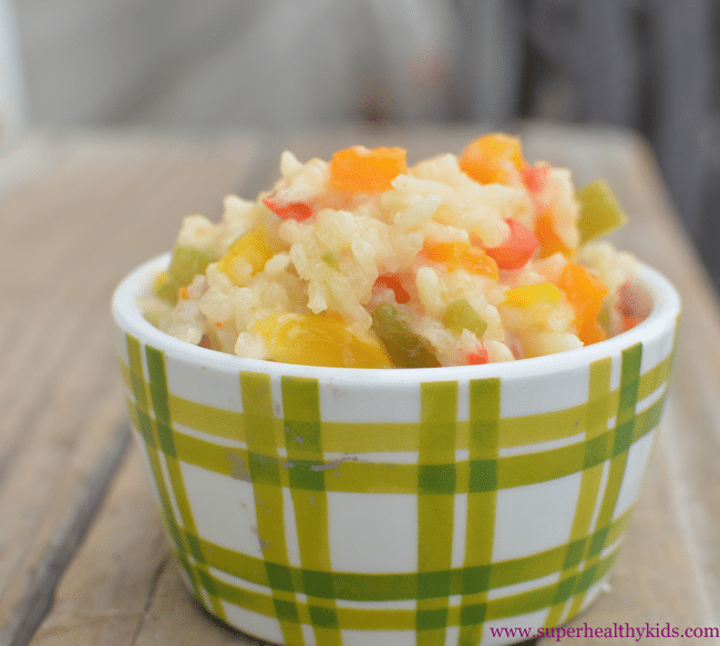 Crockpot Rainbow Risotto. Super cheesy side dish with a rainbow of veggies!